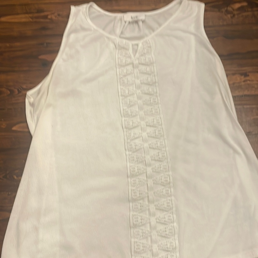 White sleeveless blouse